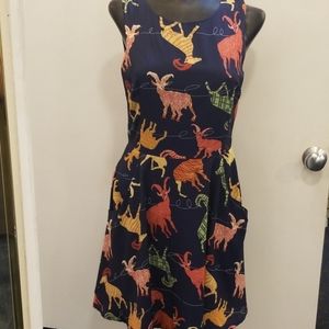 Mini dress with ram print.